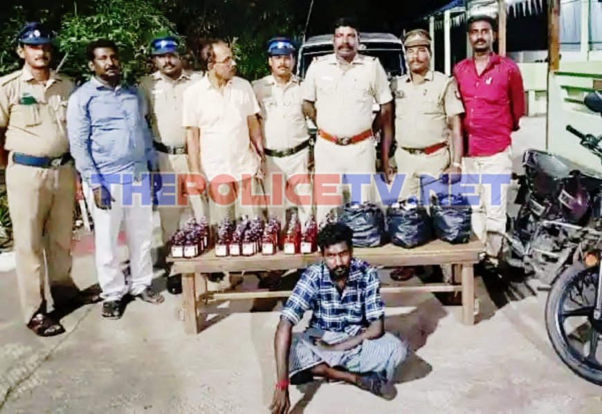 இரு சக்கர வாகனத்தில் மது பாட்டில்களை கடத்தியவர் கைது