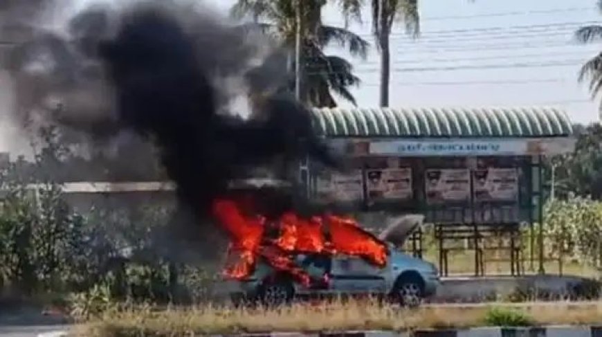 அரூர் அருகே சாலையில் சென்ற கார் திடீரென தீப்பிடித்ததால் பரபரப்பு
