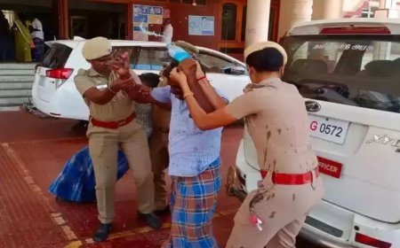 காவல் நிலையம் முன்பு இளைஞர் தீக்குளிக்க முயன்றதால் பரபரப்பு